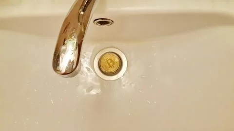 Bitcoin in the sink 写真素材