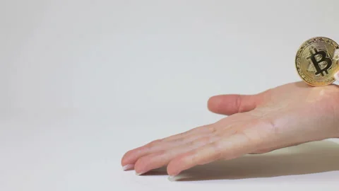 Bitcoin slides down the hand. Stock Footage 86796776