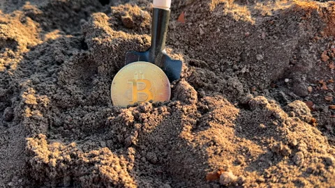 Bitcoin in soil after extraction. Сryptocurrency trading exchange. Stock-Footage 269902785