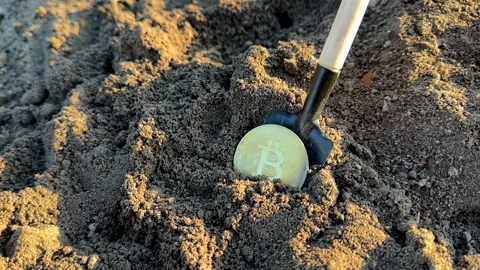 Bitcoin in soil after extraction. Сryptocurrency trading exchange. Stock-Footage 269902858
