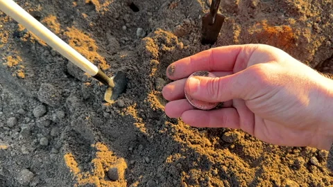 Bitcoin in soil after extraction. Сryptocurrency trading exchange. Stock Footage 269904339