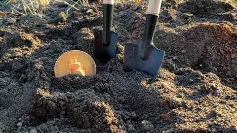 Bitcoin in soil in extraction. Ethereum, ETH coins mining in ground Stock-Footage 269902711