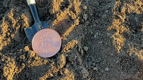 Bitcoin in soil in extraction. Ethereum, ETH coins mining in ground Stock-Footage 269902912