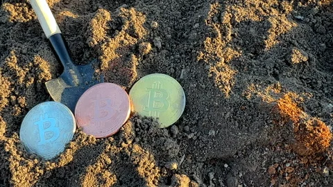 Bitcoin in soil in extraction. Ethereum, ETH coins mining in ground Stock-Footage 269902993