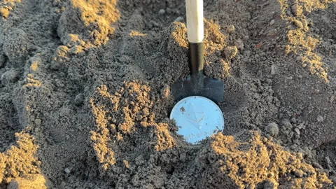 Bitcoin in soil in extraction. Ethereum, ETH coins mining in ground Stock Footage 269903561