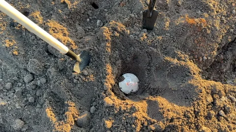 Bitcoin in soil in extraction. Ethereum, ETH coins mining in ground Stock Footage 269903956