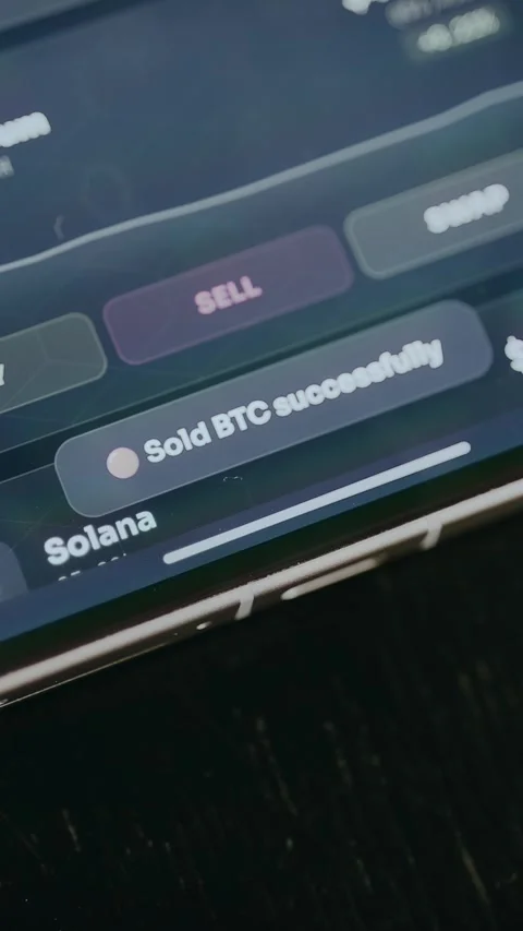 Bitcoin sold successfully message within a cryptocurrency trading interface Stock Footage 333839060