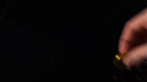 Bitcoin spin on a black mirror table Stock Footage 92760829