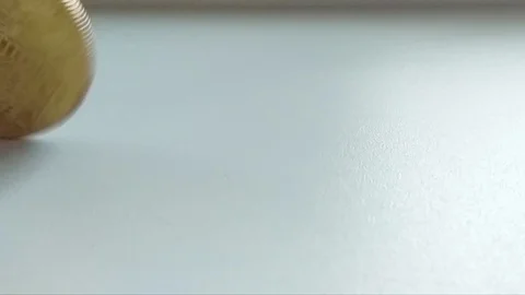 Bitcoin spinning in slow motion and fall on a white background Stock Footage 95977811