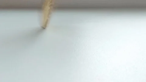 Bitcoin spinning in slow motion and fall on a white background Stock Footage 95977859