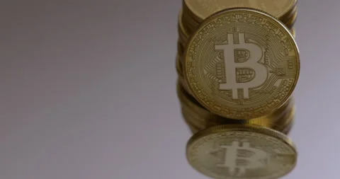 Bitcoin Stack with Clean Background Stock Footage 148181547