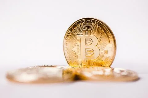 Bitcoin stands on white background Stock Photos