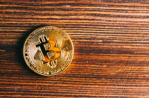 Bitcoin On Table Stock Photos