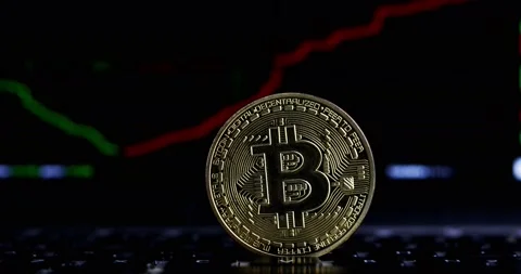 Bitcoin token, computer screen background Stock Footage 143549476