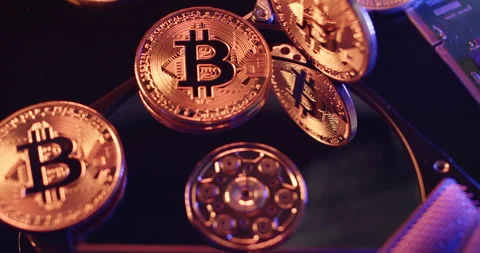 Bitcoin on top of Hard Drive. Storage of massive Blockchain Data on Server Stock Footage 172078168