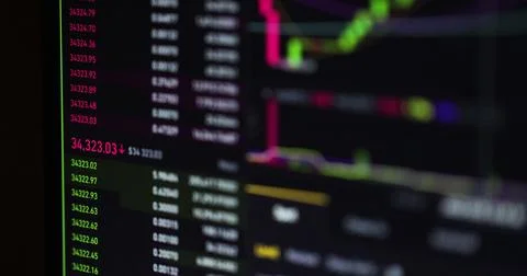 Bitcoin trading with price evolution. View at app on the screen of the laptop 스톡 사진