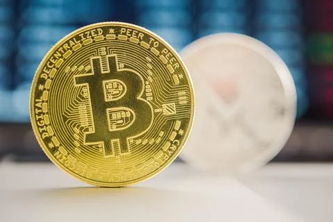 Bitcoin Virtual Currency Coin On Table. Stock Photos