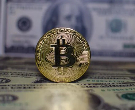 Bitcoin vs. dollar Stock Photos