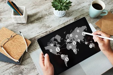 Bitcoin world map and blockchain technology concept on screen. Stock-Fotos