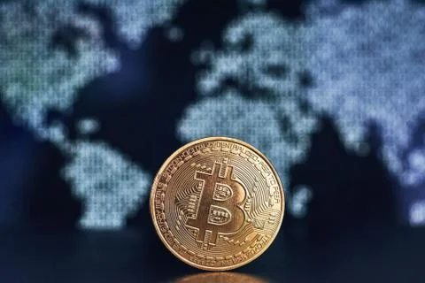 Bitcoin on world map background Foto stock