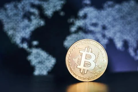 Bitcoin on world map background Stock Photos