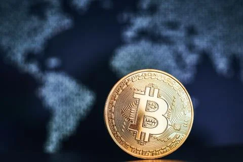 Bitcoin on world map background Stock Photos