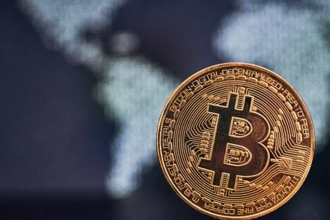 Bitcoin on world map background Stock Photos