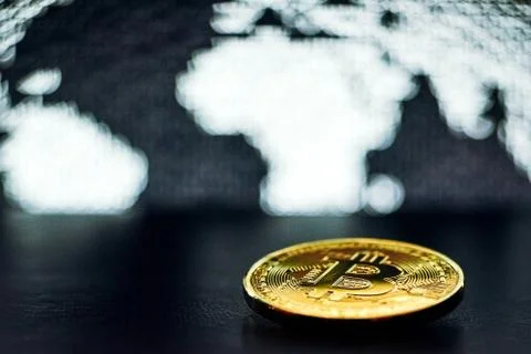 Bitcoin on world map background Stock Photos