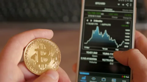 Bitcoin is a worldwide cryptocurrency and digital payment system. Businessman Stock Footage 86154574