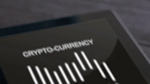 Bitcoins and tablet with growth chart on screen, dolly shot Stock Footage 83274968