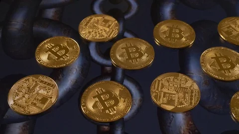 Bitcoins on an animation of turning chains, camera move left to right Stock Footage 87371975