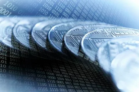Bitcoins on blue binary code background 写真素材