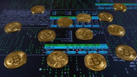 Bitcoins on computer code animation, camera move left to right 库存影片 87446138
