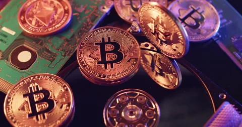 Bitcoins on to of Computer Hardware. Industry 4.0 and digital trading concept Stock Footage 172051347