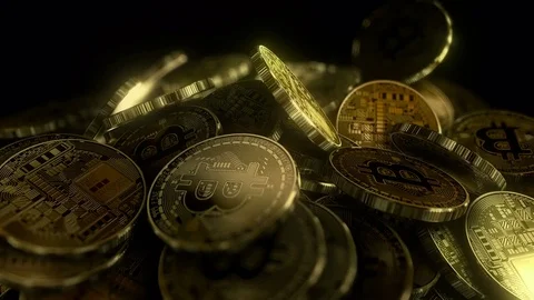 Bitcoins Falling on a Stack. Bit Coin BTC. Stock Footage 84340756
