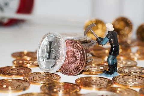 Bitcoins with a figure Stock Photos