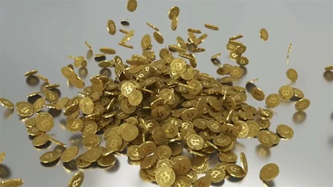Bitcoins golden falling down on silver surface. Stock Footage 83298521
