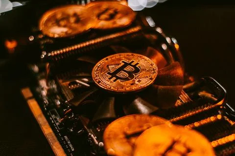 Bitcoins on graphic videocard Stock Photos