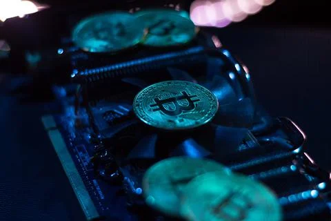 Bitcoins on graphic videocard Stock Photos