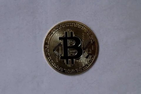 Bitcoins on gray paper Stock Photos