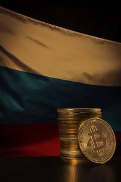 Bitcoins over Russian flag Stock Photos