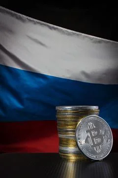 Bitcoins over Russian flag Stock Photos