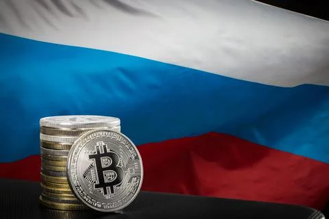Bitcoins over Russian flag Stock Photos