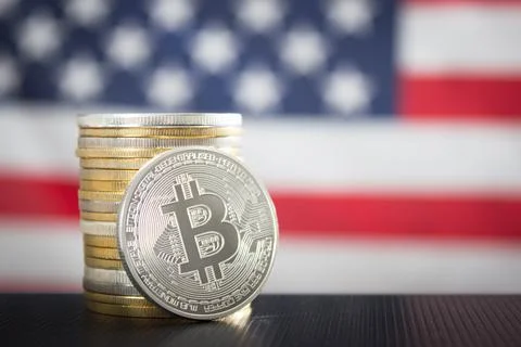 Bitcoins over USA flag Stock Photos