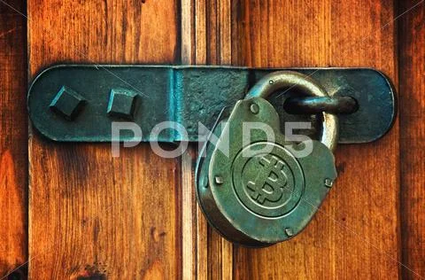 Bitcoins on padlock Stock Photos