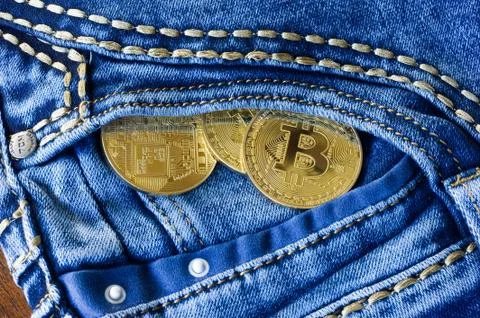 Bitcoins in pocket Stock Photos