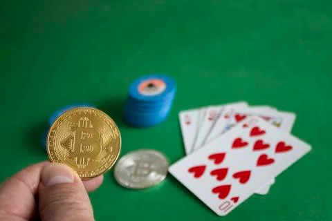 Bitcoins on poker table Stock Photos