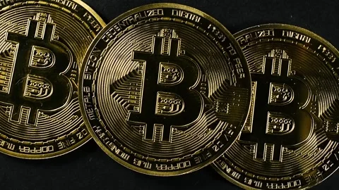 Bitcoins Rotating on Black Background Stock Footage 336325276