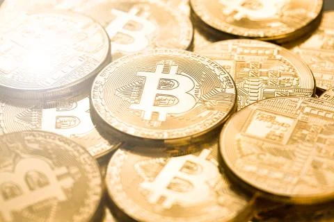 Bitcoins with selective focus. Physical bit coins. Digital currency Stock Photos