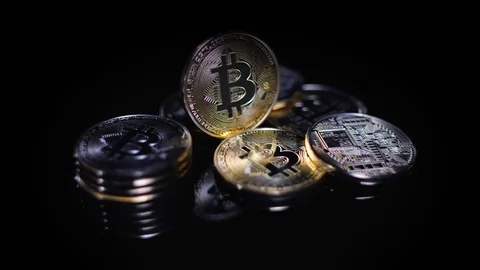 Bitcoins slowly rotate counter clockwise Stock-Footage 124907571